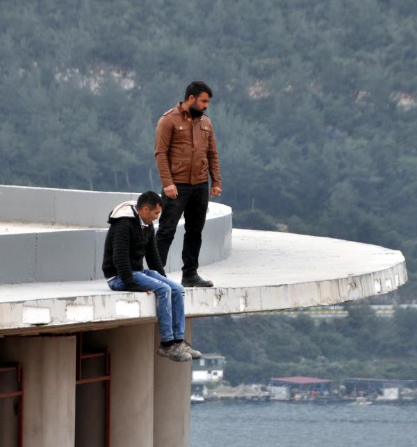 BİNANIN TEPESİNDE ALACAK EYLEMİ…