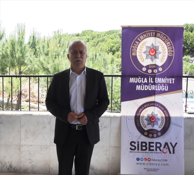 AA-20220602-28055322-28055321-MUGLA_POLISINDEN_TATILCILERE_SAHTE_REZERVASYON_DOLANDIRICILIGI_UYARISI
